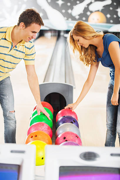 istock Couple at the bowling alley. 477898317
