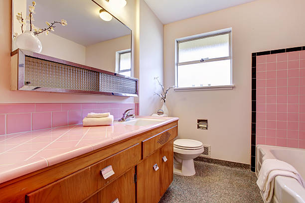 istock PInk old bathroom interior with tub. 477898523