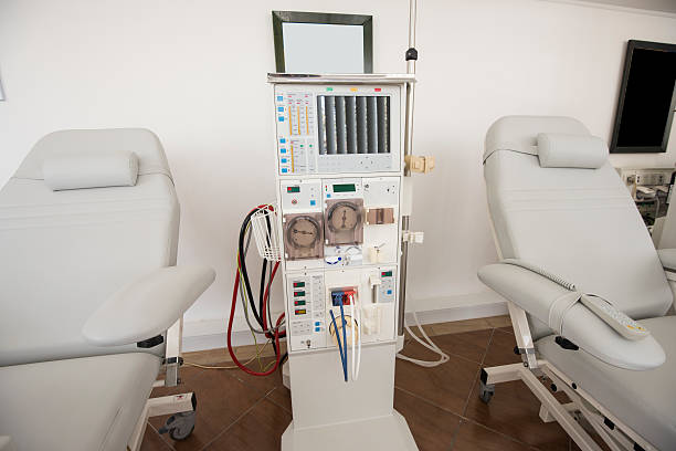 Dialysis machine in a medical center Closeup of dialysis machine and bed in a medical center dialysis photos stock pictures, royalty-free photos & images