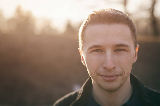 istock handsome young man closeup portrait 477899004