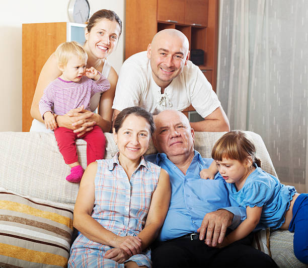 istock three generations family   in home 477899194