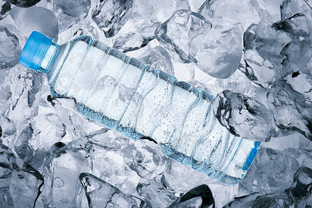 Water Bottle and Ice Cube stock photo