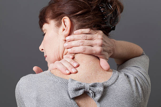 neck and shoulder gestures for releasing tension acupressure for relaxing shoulder and backache cervical vertebrae photos stock pictures, royalty-free photos & images