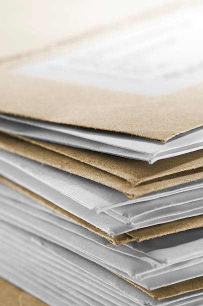 istock Pile of brown and white envelopes received in post 477903139