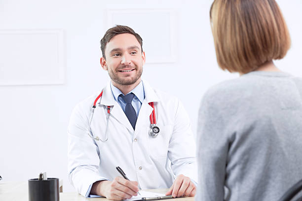 istock Smiling cardiologist talking to the patient 477907990
