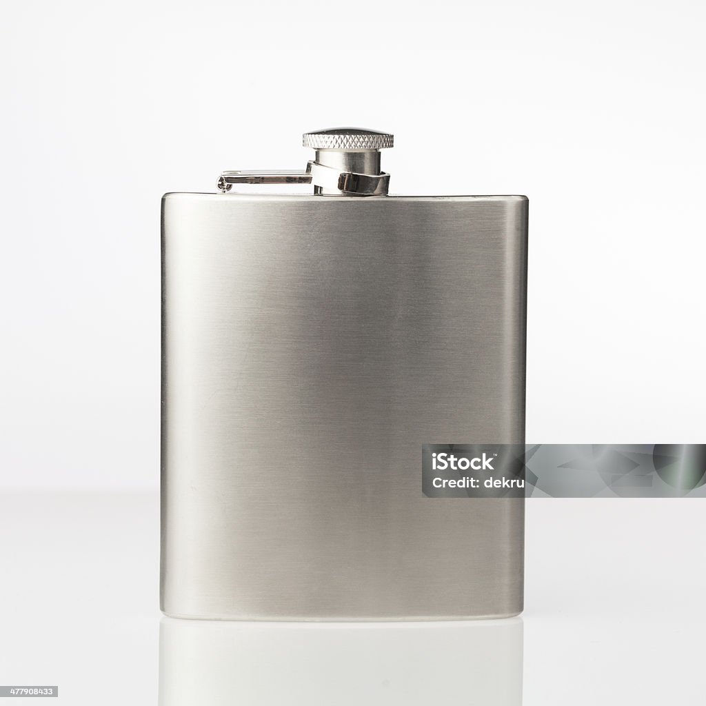 Stainless hip flask Thin flask for holding a distilled beverage. Size and shape are suited to a trouser pocket. Ready for engraving. Hip Flask Stock Photo