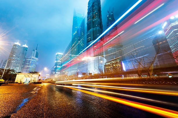 istock light trails on the modern building background in shanghai china 477909971