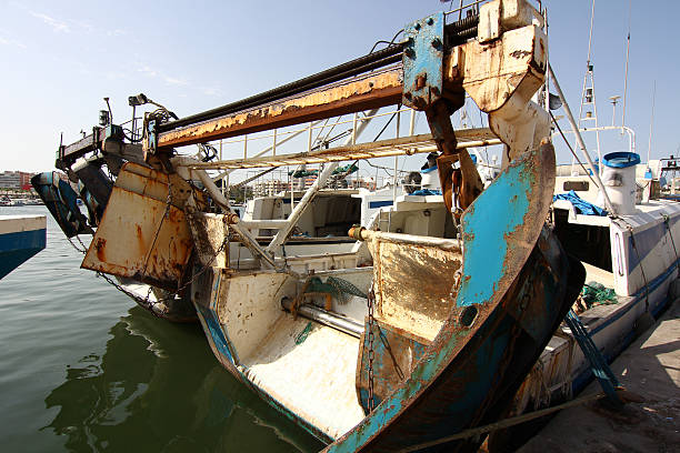 istock Fishing boats and nets to collect systems 477910373