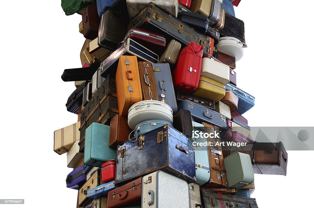 Overpacked - High Stack of Luggage NOTE TO INSPECTOR:  The Artist, Brian Goggin, incorrectly filled out the iStock form, however we had a side agreement where I provided him 100.00 for the license.  Please see both documents that I have attached in one file.  I am hoping this will suffice as it took the artist months to return the incorrect document to me.  I will seek a corrected document if you need it.  Thank you.  Please erase this if approved.  (or I can do it once it's online) Stack Stock Photo