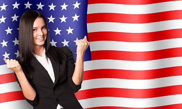 istock Smiling woman in winner posture 477911642