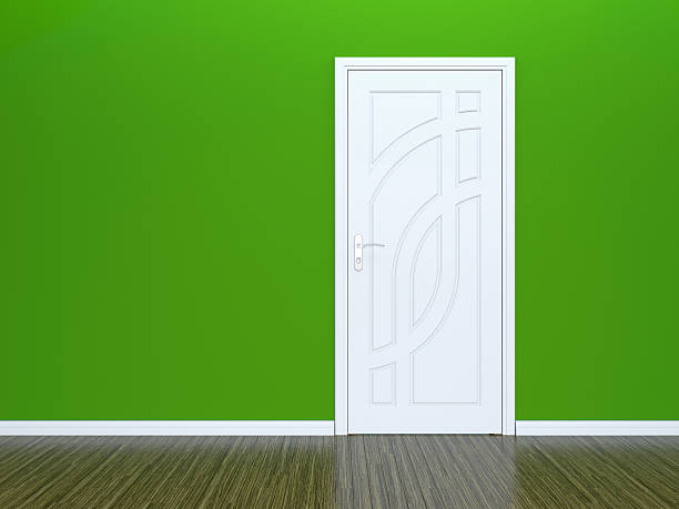 istock White door and green wall 477911911