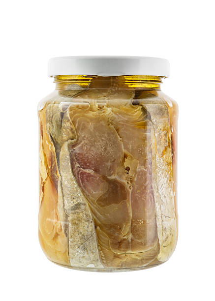 istock Glass jar of salted mackerel fish 477912255