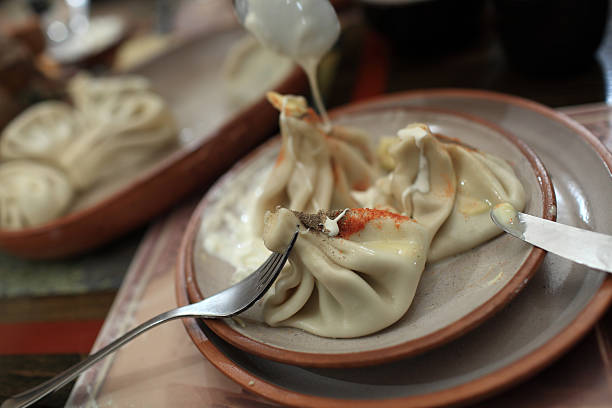 istock Khinkali with pepper and sour cream 477913508