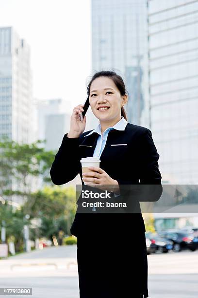Asian Businesswoman On The Phone Stock Photo - Download Image Now - 2015, 30-39 Years, Adult
