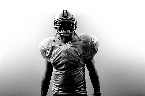 American Football RunningBack Power The power of the american football player before the game. football player stock pictures, royalty-free photos & images