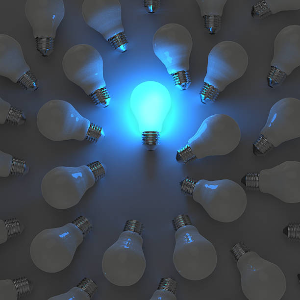 istock 3d growing light bulb standing out from the unlit incandescent 477917685