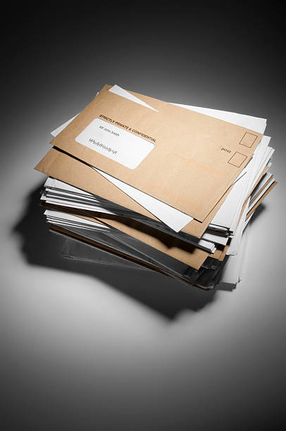 istock Pile of brown and white envelopes received in post 477918157