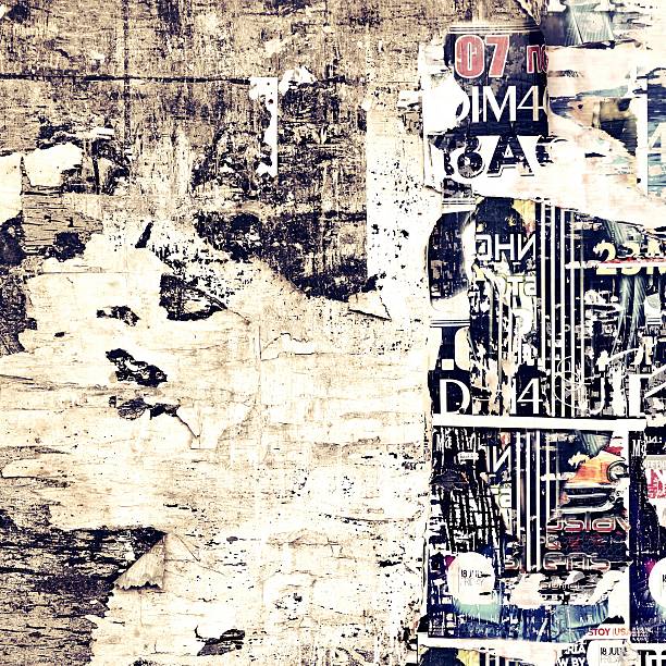 istock Old Weathered Wood Billboard with Torn Posters 477919038