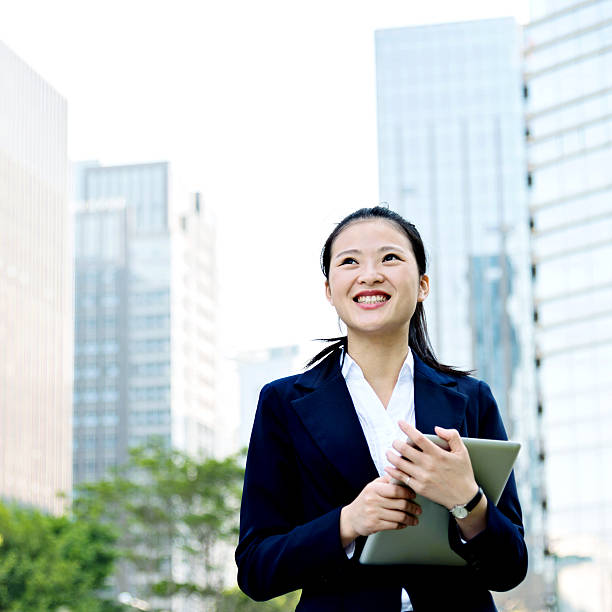 istock Asian businesswoman using digital tablet 477919816