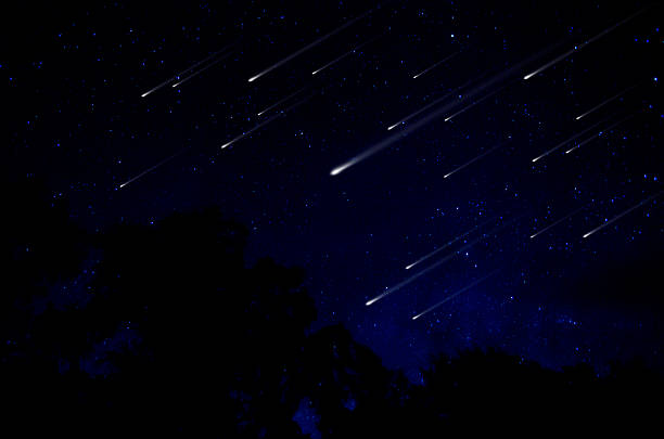 istock Meteor shower in night sky illustration 477920536