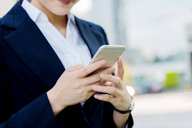 istock Asian businesswoman using smart phone 477920732