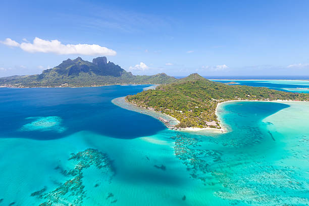 french polynesia from helicopter gorgeous view at bora bora island from the helicopter bora bora mountain stock pictures, royalty-free photos & images