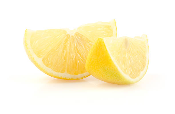 レモンのスライス - lemon textured peel portion ストックフォトと画像