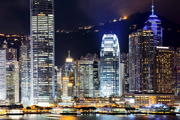 istock Hong Kong at night with highrise buildings 477931494