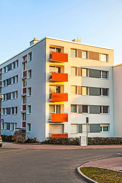 istock Apartment building with blue sky 477933339