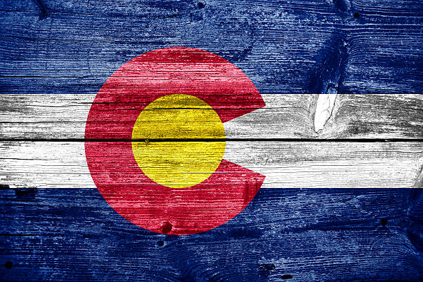 Colorado State Flag painted on old wood plank texture stock photo