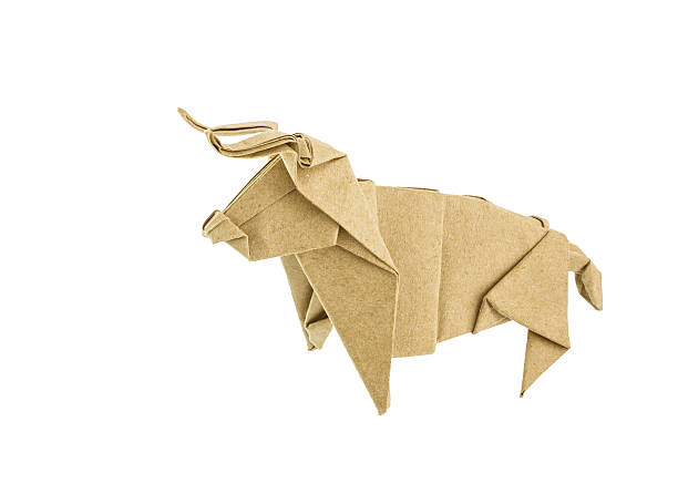 Origami bull recycle  paper stock photo