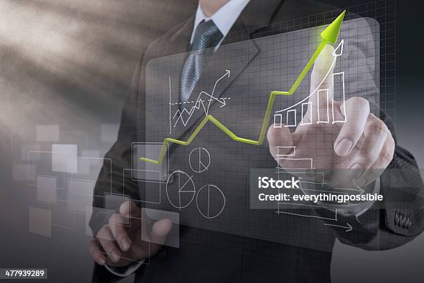 Businessman Hand Drawing A Pie Chart Stock Photo - Download Image Now - Achievement, Aspirations, Blue