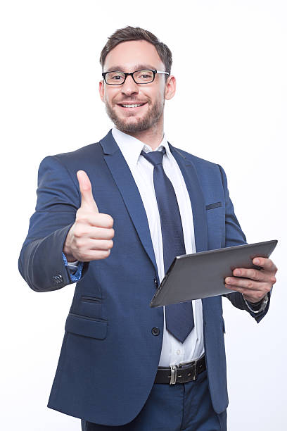 istock Nice businessman holding the laptop 477939900