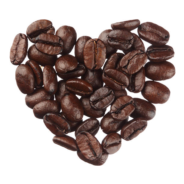 istock Coffee beans heart isolated on white background close up 477939973