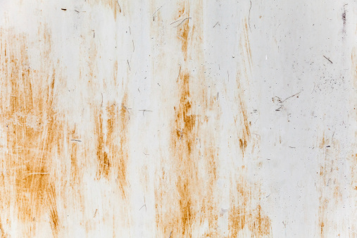 Rusty stained metal plate background