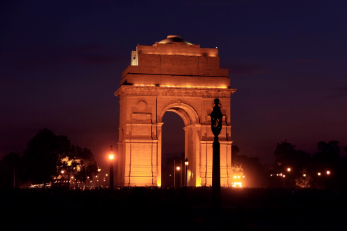 Famous, illuminated India Gate in New Delhi, India during dusk. Long exposure.