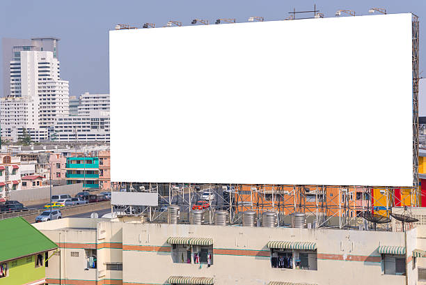 istock large blank billboard with city view background 477943570