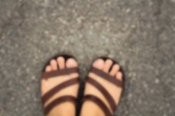 istock blur slippers on street 477946818
