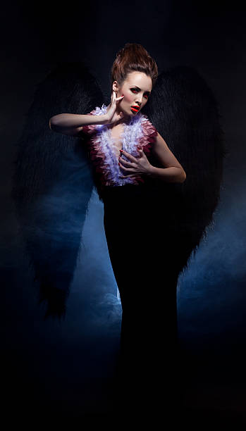 istock Bloodthirsty girl - fallen angel posing at camera 477947567