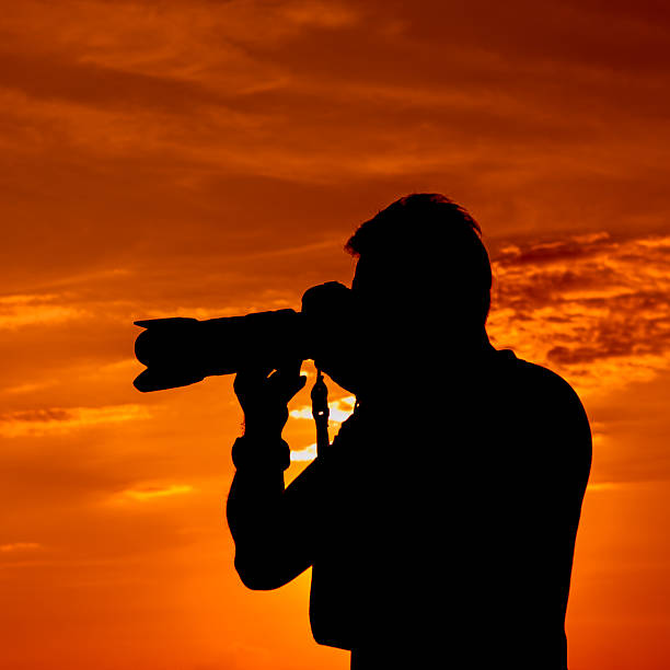 istock Silhouette of a photographer 477948357