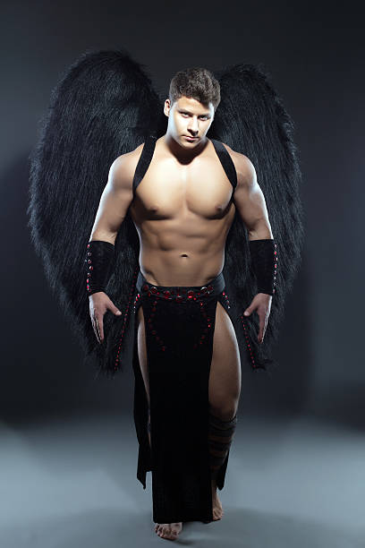 istock Handsome muscular guy posing as fallen angel 477948951