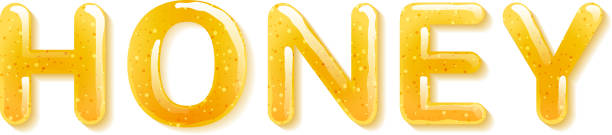 istock Yellow honey jelly word. Glossy letters 477950390