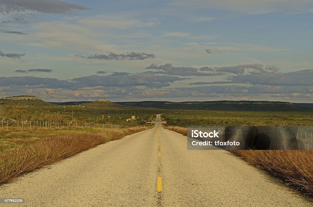 Texas Road A old hwy travels through the southern Texas desert near San Antonio West - Direction Stock Photo