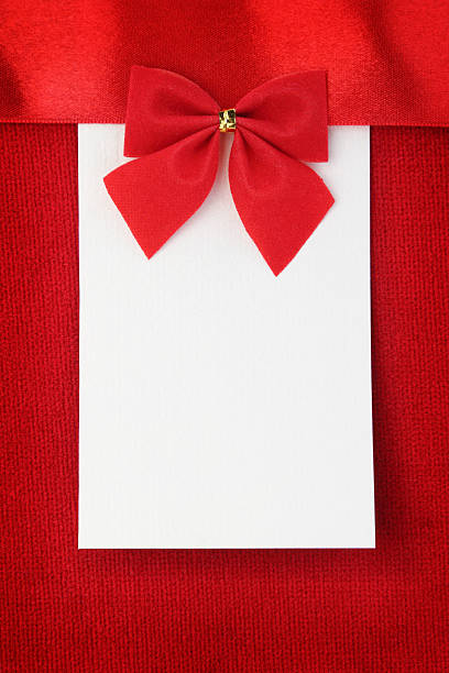istock Blank paper greeting card on red background 477961483