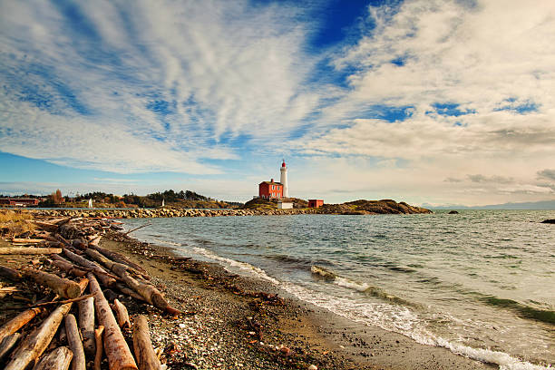 Fisgard lighthous in British Columbia Fisgard lighthous in British Columbia in Canada, blue sky, sunny, ocean victoria canada stock pictures, royalty-free photos & images