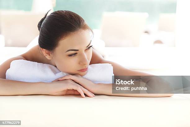 Beautiful Young Woman Relaxing After Massage Stock Photo - Download Image Now - Achievement, Adult, Alternative Therapy