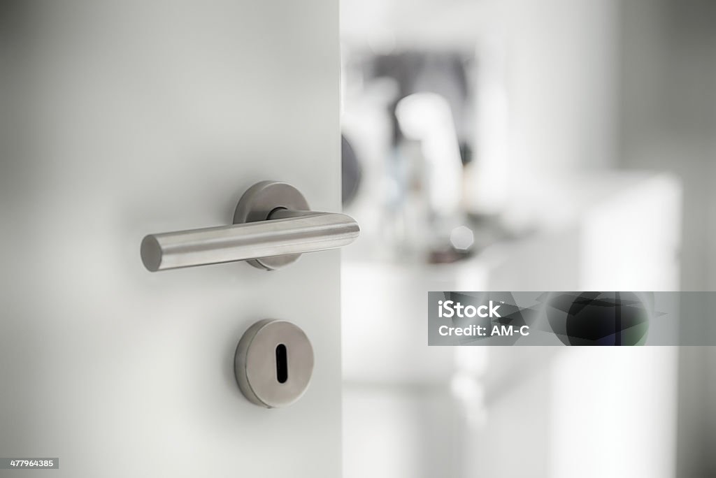 Door latch at the bathroom Doorknob Stock Photo