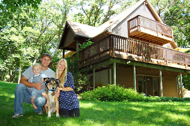 istock Family at Cabin in Woods 477967151