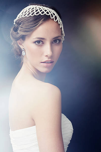 istock Portrait of glamorous young bride, studio shot 477967323