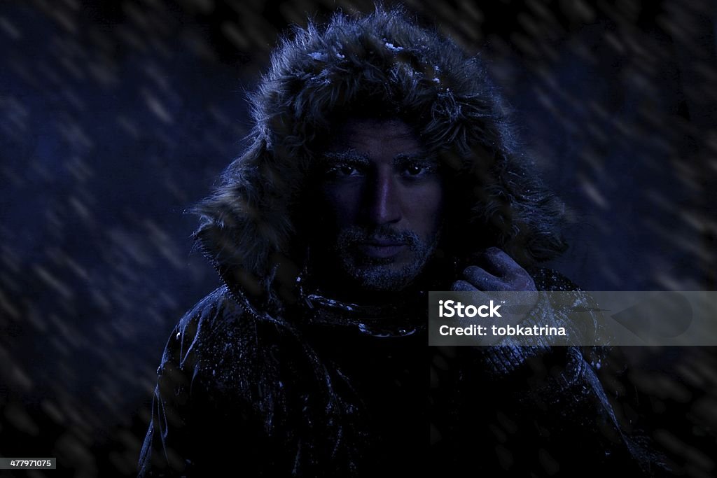 Dark Dramatic Man Freezing in Cold Weather Dramatic Image of Scruffy Man Freezing in Cold Weather Adult Stock Photo